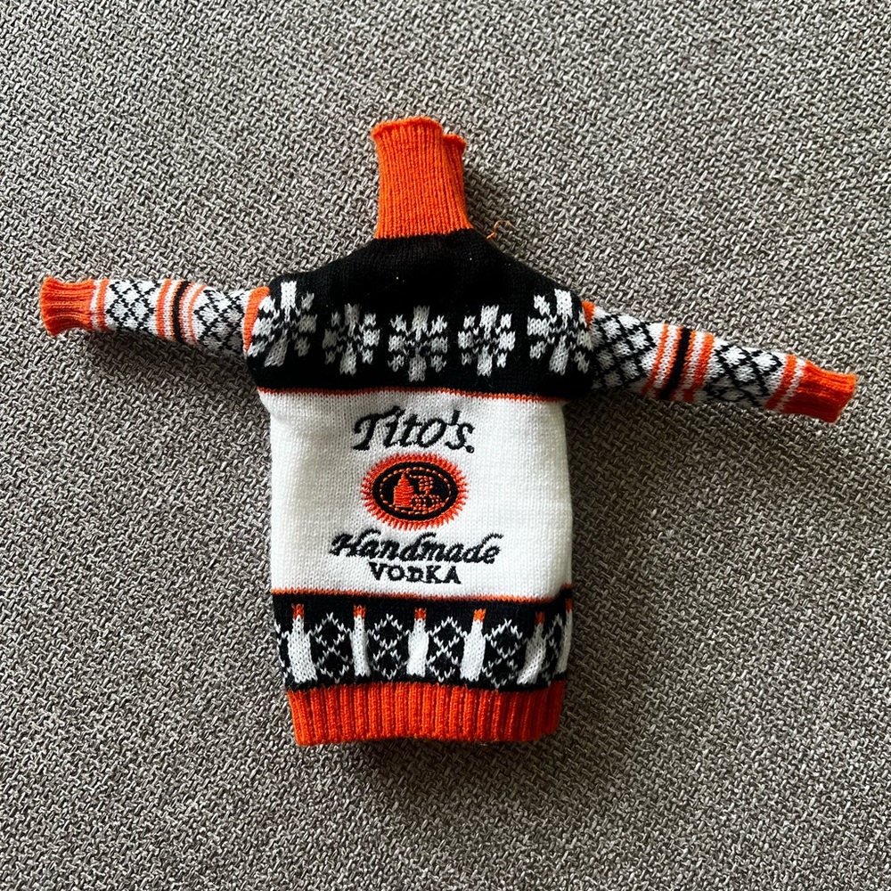 Tito's Handmade Vodka Mini Sweater Bottle Cover - Black, White, and Orange